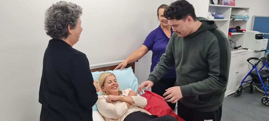 Local member Angie Bell MP was super hands on during her visit to GESS Education campus at Southport. Their allied health students got to demonstrate the skills first hand as Angie step in to be their patient.