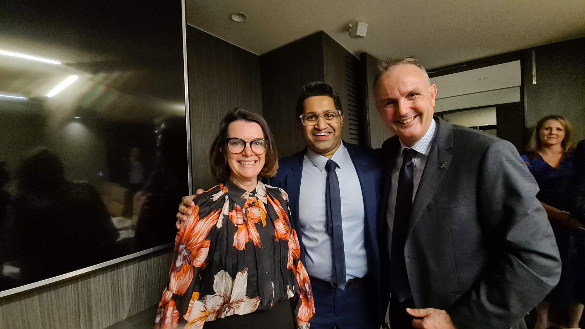 Taher Ali and Brenden Brien engage with Minister Ruston at an industry dinner for the employment and training industry